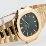 Patek Philippe Nautilus 3700/11J Vintage Yellow Gold Black Ribbed Dial - Image 2