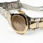 Patek Philippe Nautilus 4700/51 'Ladies' Stainless Steel Yellow Gold Champagne Dial Quartz - Image 4