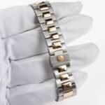 Patek Philippe Nautilus 3800/1AJ Stainless Steel Yellow Gold Champagne Dial (1994) - Image 3