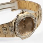 Patek Philippe Nautilus 4700 'Ladies' Yellow Gold Champagne Diamond Dial Diamond Bezel - Image 2